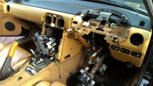 The MX-5's tan interior being removed